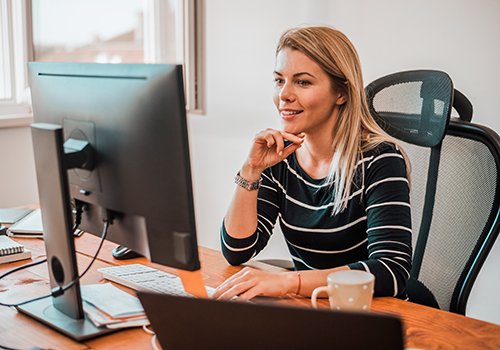 Young woman at computer