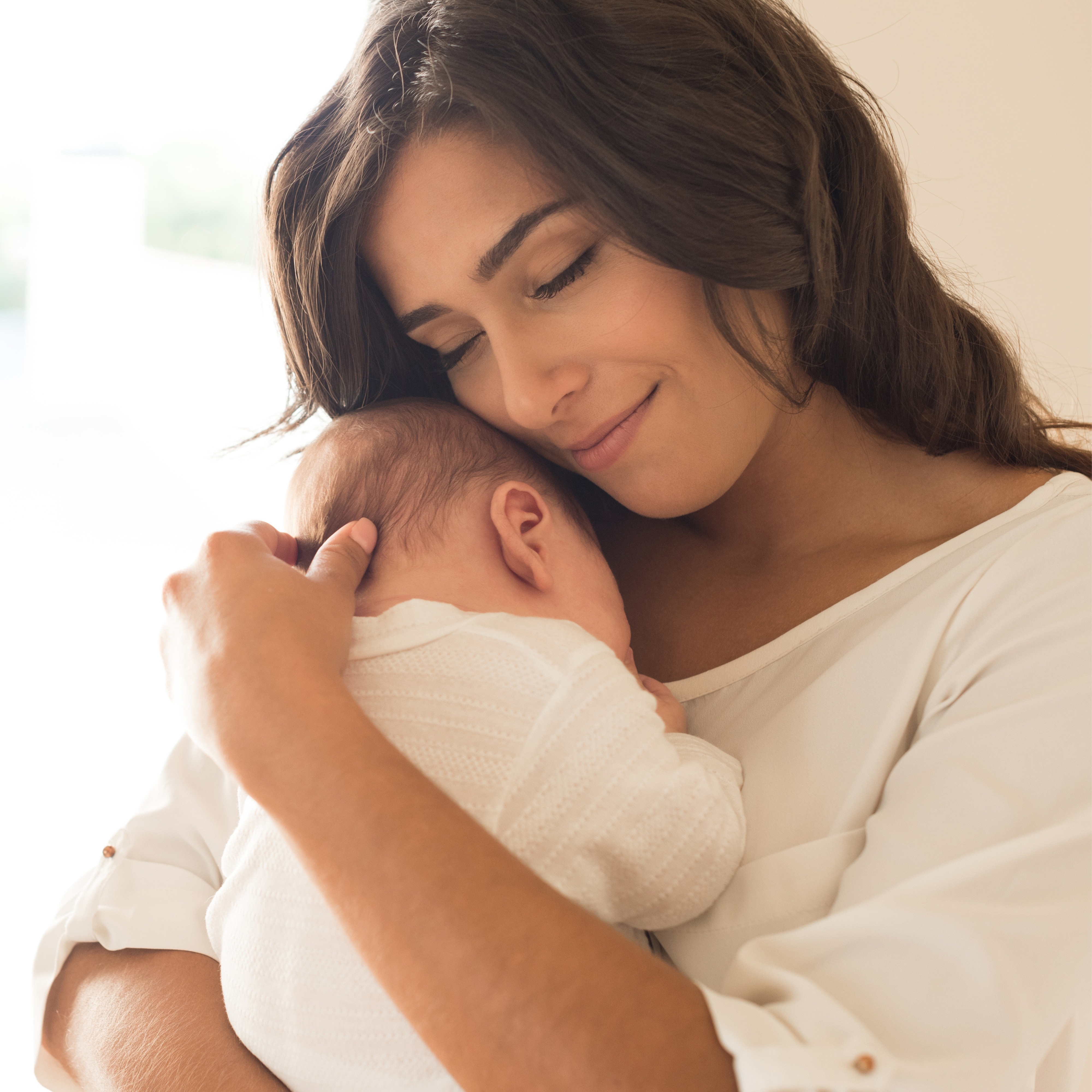 Smiling woman and baby